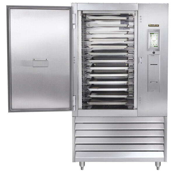 A Traulsen Spec Line blast chiller with a door open and trays inside.