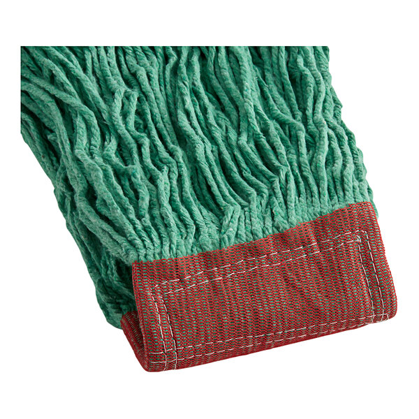 A green mop head with a red stripe.