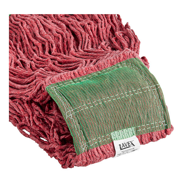 A close up of a red Lavex Pro rayon blend mop head with a green patch.