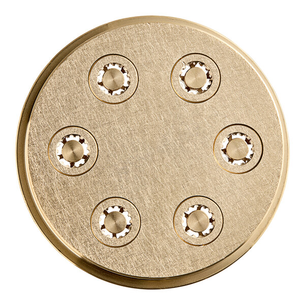 A circular brass disc with six holes in a circular design.
