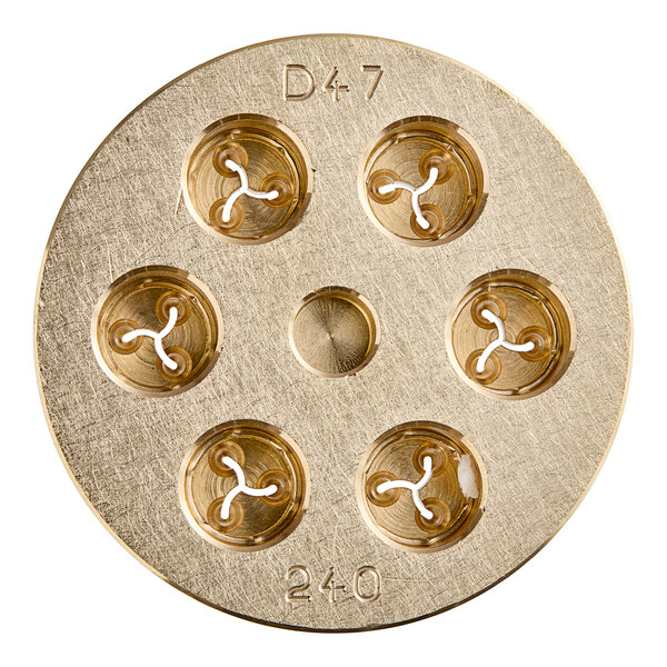 A circular brass Estella Fusilli Pasta Die with holes in it.