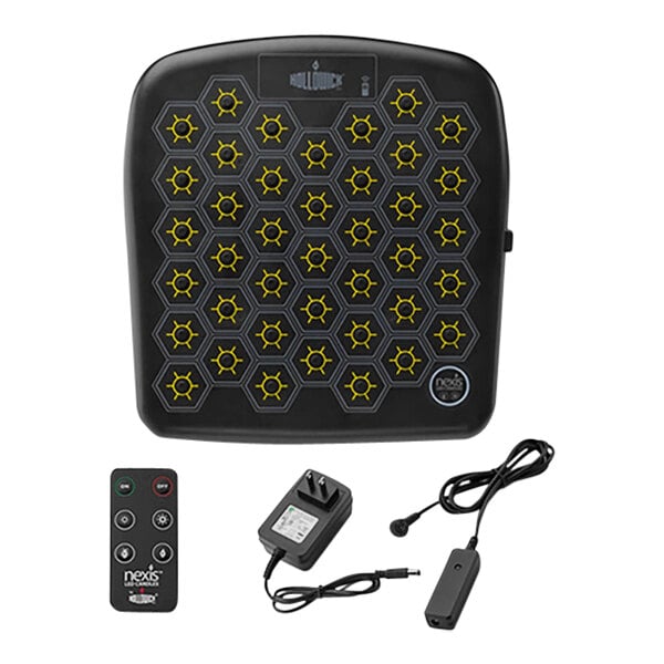 A black electronic charging tray with yellow hexagons and a black power adapter.