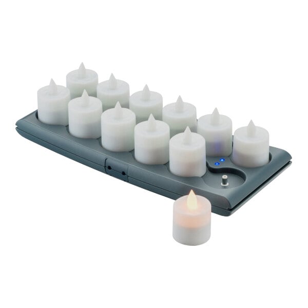 A set of amber Hollowick V12 rechargeable flameless candles on a charging tray.