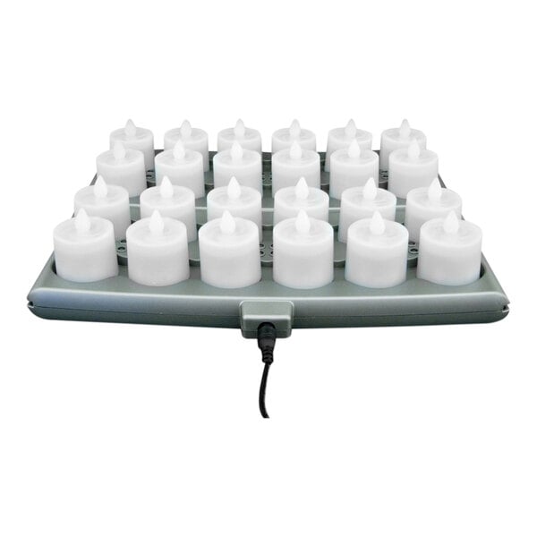 A white tray holding Hollowick Platinum+ clear rechargeable flameless candles.