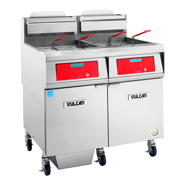 A commercial-grade, stainless steel, four-unit floor fryer with digital controls and filtration system.