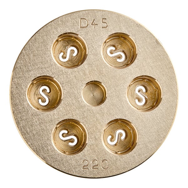 A circular brass Casarecce pasta die with holes in it.
