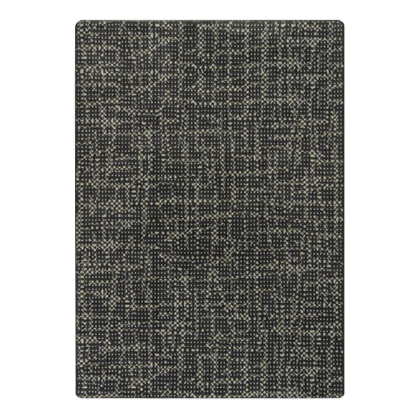 A close-up of a black and white patterned Joy Carpets area rug.
