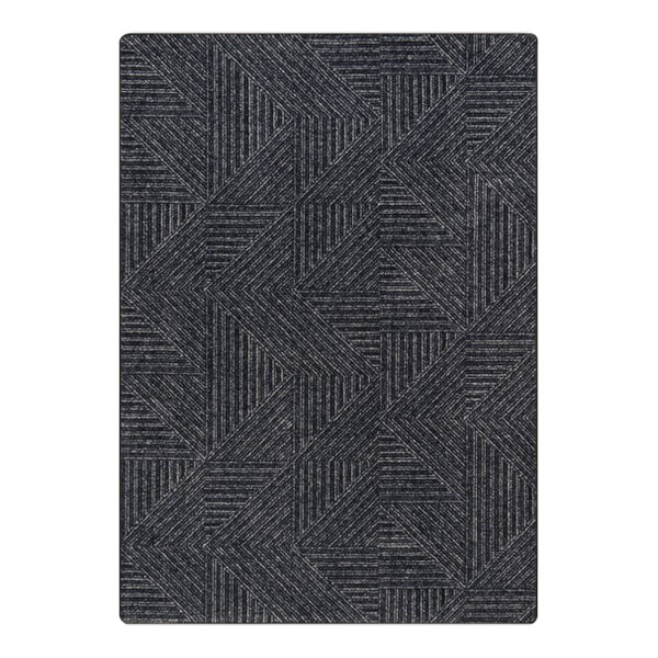 A close-up of a black and grey geometric pattern on a Joy Carpets WorkSpace Above Board area rug.