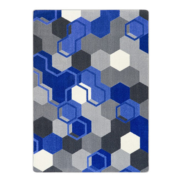 A Joy Carpets blue and grey hexagon patterned area rug.