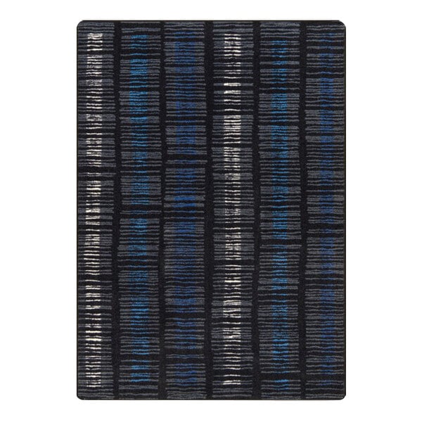 A close-up of a black and blue Joy Carpets Kid Essentials Verve area rug with a pattern.