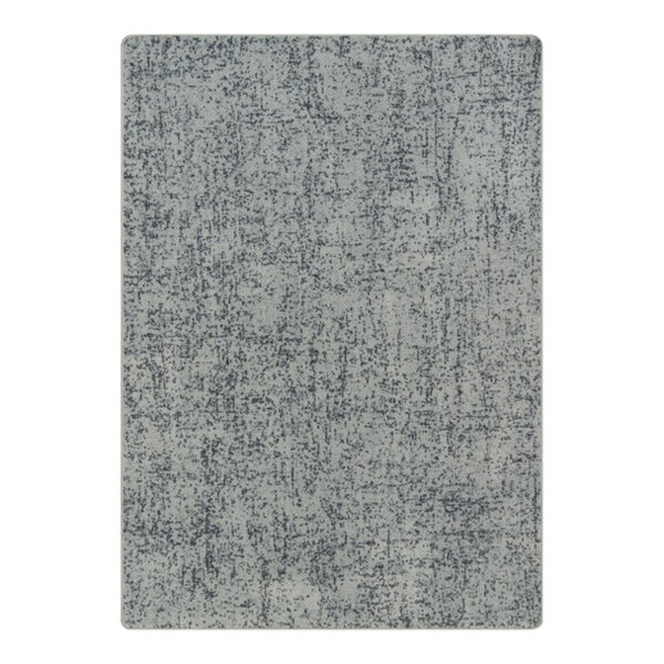 A gray rectangular area rug with a pattern that looks like black specks.