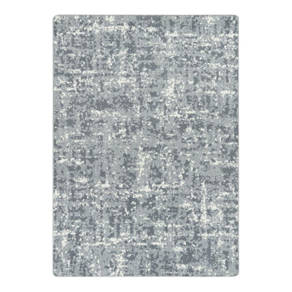 A close-up of a grey and white speckled Joy Carpets WorkSpace area rug.