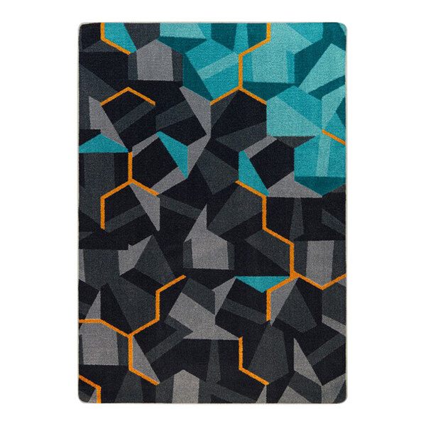 A close up of a Joy Carpets teal area rug with geometric shapes in blue, black, and orange.