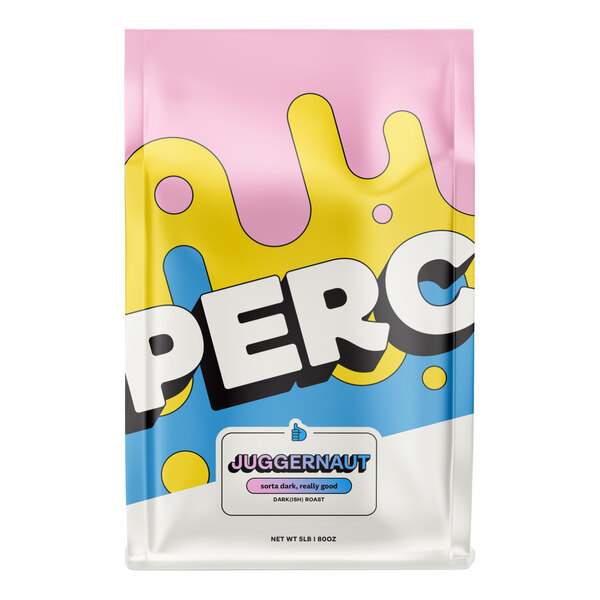 A pink and yellow bag of PERC Brazil Juggernaut whole bean espresso with white text.