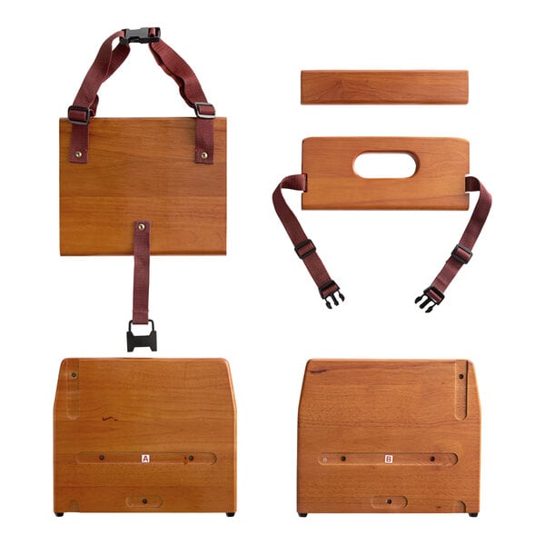 A Lancaster Table & Seating wooden booster seat with straps and a strap holder.