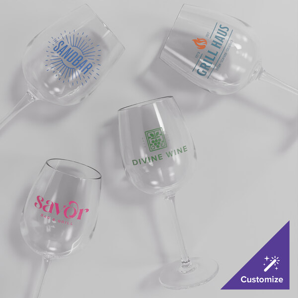 A group of Acopa Endure customizable wine glasses with a logo on one.
