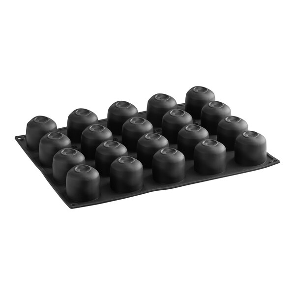 A black silicone tray with round objects in rows.