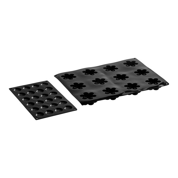 A black Pavoni silicone baking tray with oval and round holes.