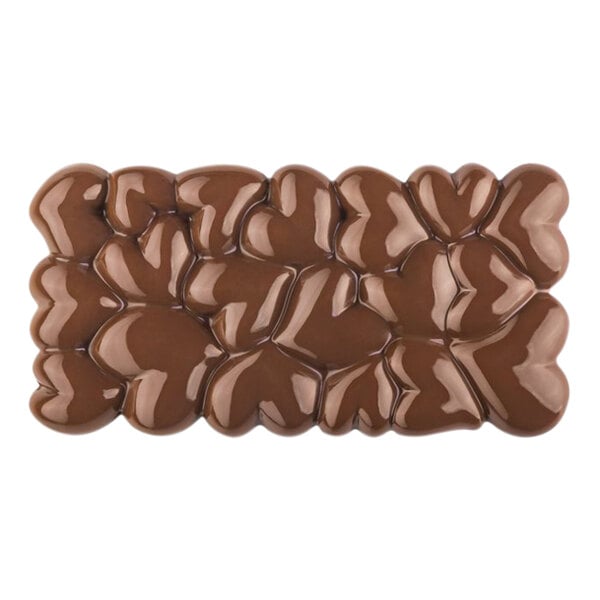 Pavoni polycarbonate chocolate bar mold with heart-shaped cavities.