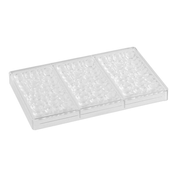 A clear plastic Pavoni chocolate bar mold with three compartments.