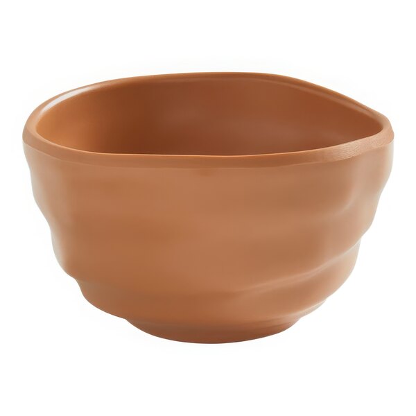 An American Metalcraft Marra terracotta bowl with curved edges.