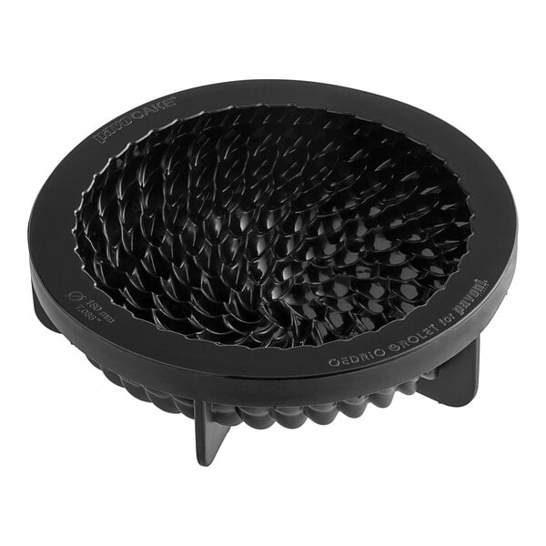 A black silicone baking mold with circular compartments.