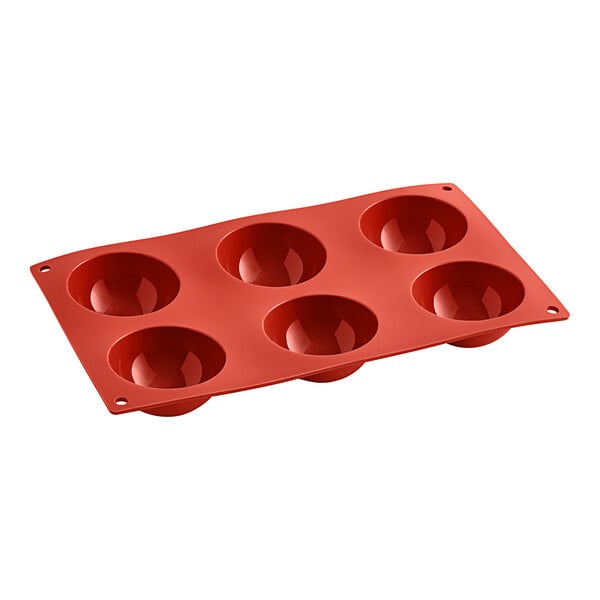 A red Pavoni silicone baking mold with six round compartments.