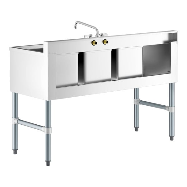 A stainless steel three-bowl sink with a faucet and a left-side drainboard, supported by four metal legs.