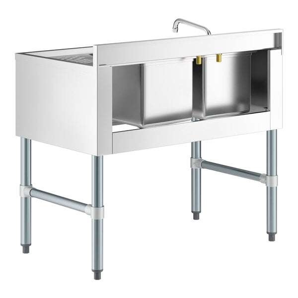 A stainless steel two-bowl sink with a right-side drainboard and a faucet, supported by four metal legs.