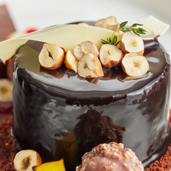 A chocolate cake with Raw Oregon Filberts on top.