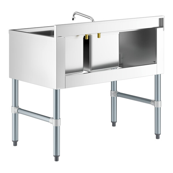 A Regency stainless steel underbar sink with faucet, left drainboard, and two bowls.