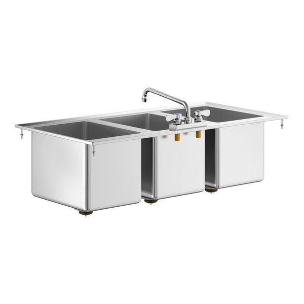 A stainless steel three-compartment drop-in sink with a central faucet and three deep basins.