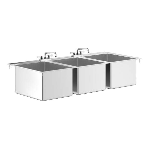 A stainless steel three-compartment drop-in sink with two swing faucets mounted at the back.