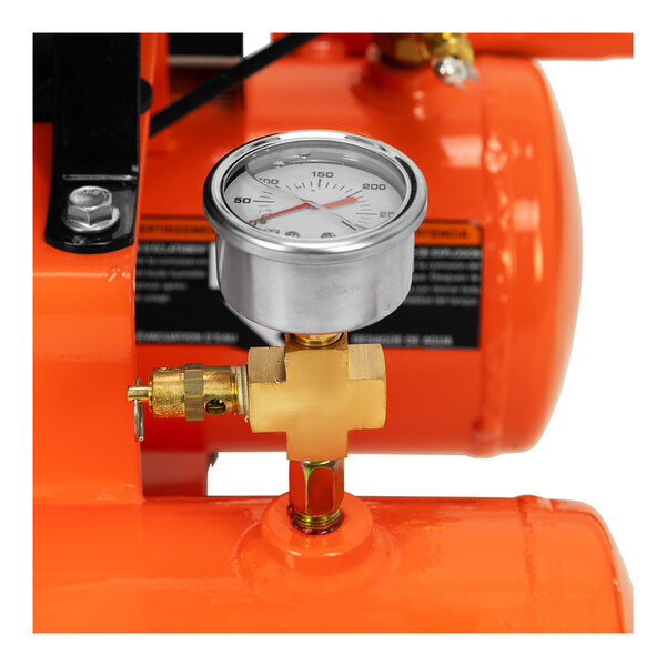 An orange Industrial Air Contractor air compressor with a pressure gauge.
