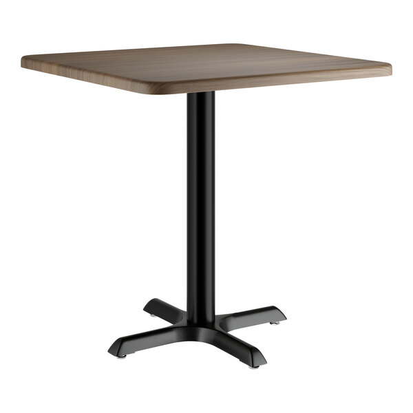 A Lancaster Table & Seating square table with a dark walnut finish top and black base.