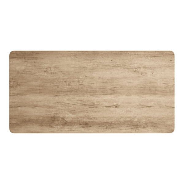 A rectangular wood surface with a gray wood finish.