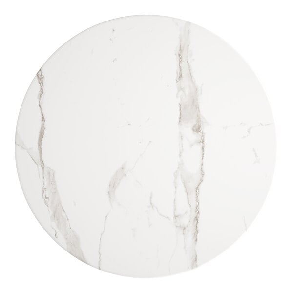 A white marble table top with gray veins.