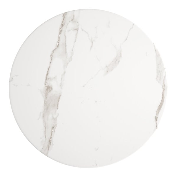 A white marble table top with a round surface.