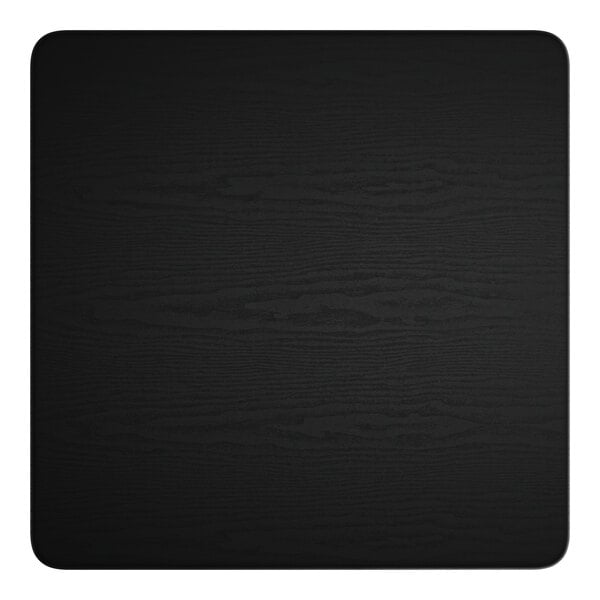 A black square table with a black wood finish.