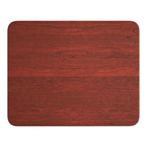 A Lancaster Table & Seating rectangular MDF table top with a red mahogany finish.