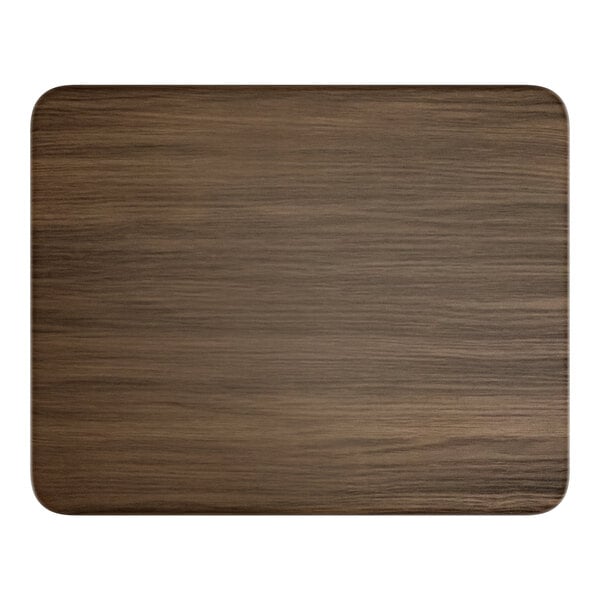 A rectangular wood table top with a dark walnut finish.