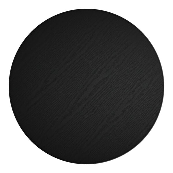 A black circular Lancaster Table & Seating table top.