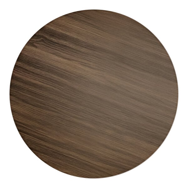 A Lancaster Table & Seating round wood table top with dark walnut finish.