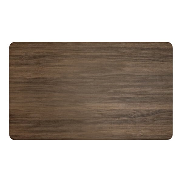 A rectangular wood table top with a dark walnut finish.