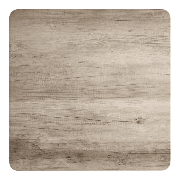 A square standard height table with a gray wood finish and rounded corners.