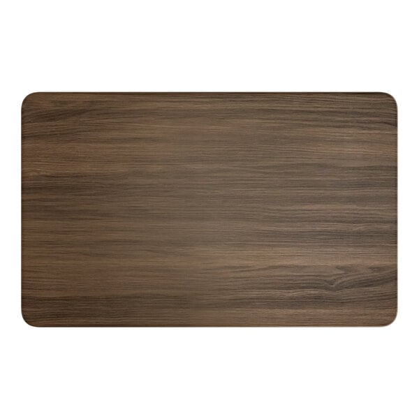 A rectangular wood table top with a dark walnut finish.