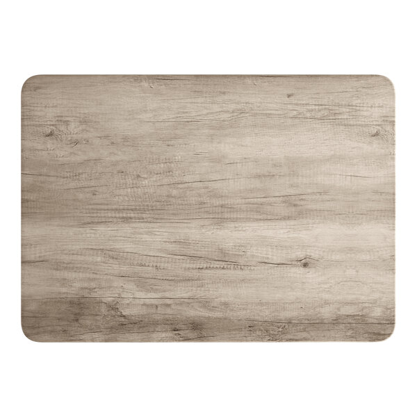 A rectangular standard height table with a gray wood finish and rounded corners.