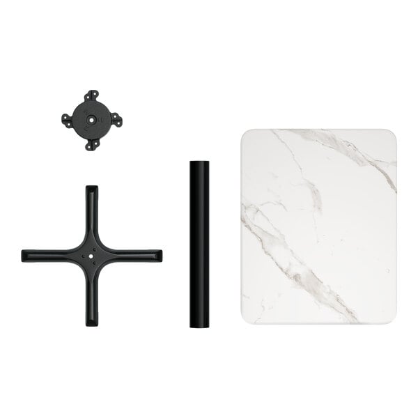 A white rectangular Lancaster Table with a white marble finish on a black metal base with a black cross design.