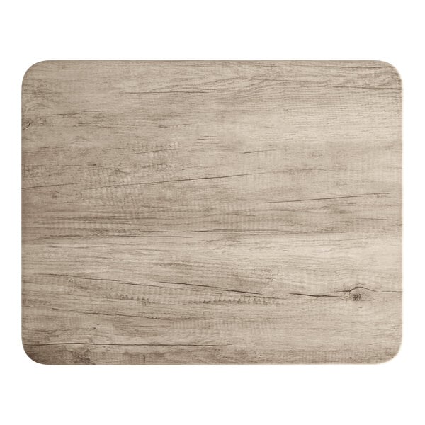 A rectangular MDF table top with a gray wood finish and rounded corners.