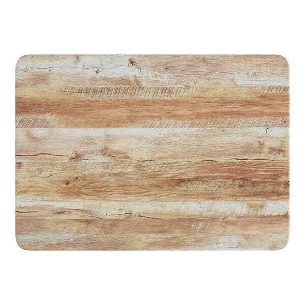 A wood surface with a barnwood finish.